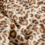 Frottee-Jersey Leo warmbraun/creme